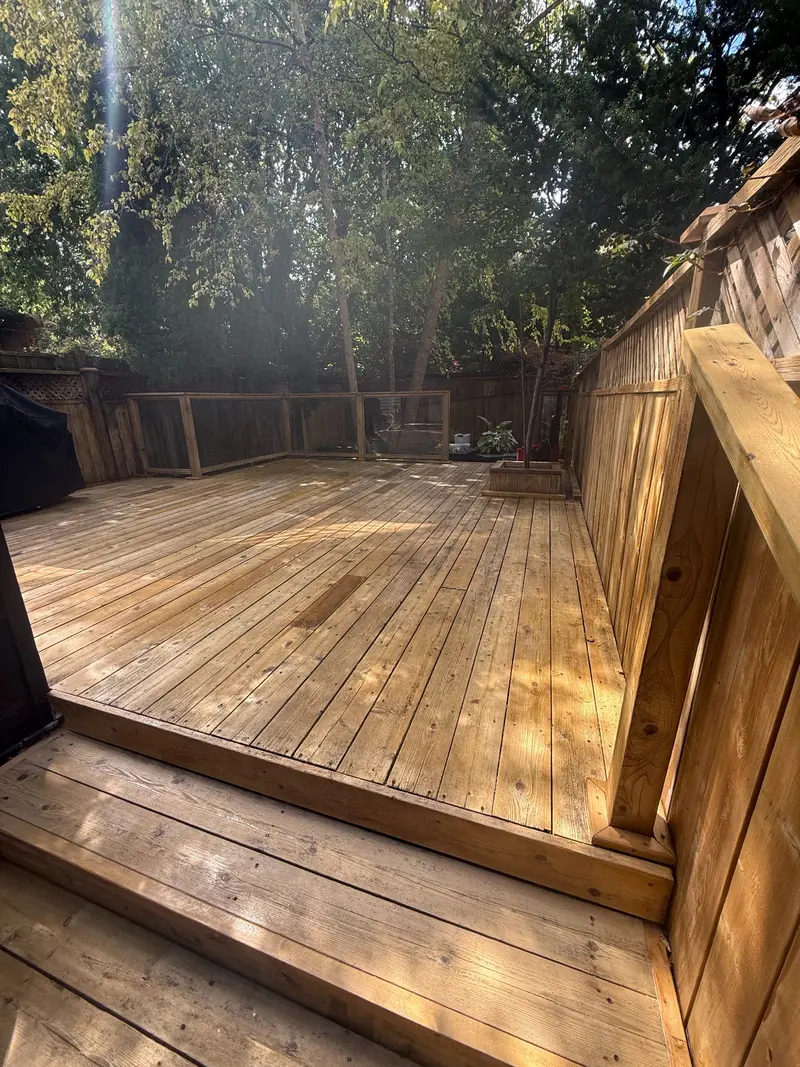 Finished cedar deck and privacy enclosure after restoration